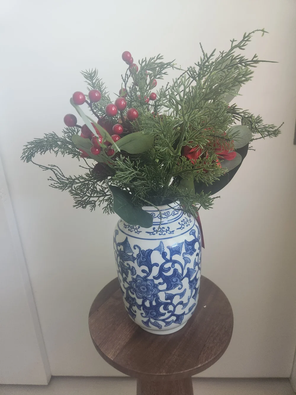 Blue and White Chinoiseire Ceramic Ginger Jar Vase with Holiday Pine Arrangement